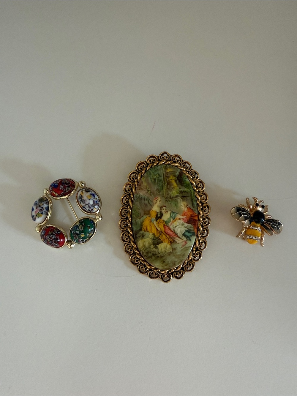 Vintage-Style Oval Scenic Brooch in Gold Tones with Floral and Bee Pins
